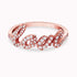 0.21Ct. Diamonds mounted in a 14K Rose Gold Love designed Ring