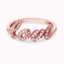 0.21Ct. Diamonds mounted in a 14K Rose Gold Love designed Ring