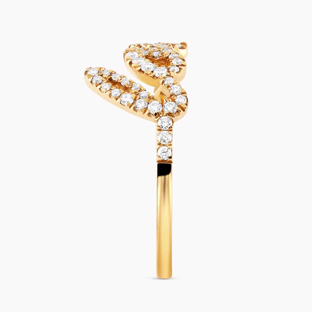 0.32Ct. Diamonds mounted in a 14K Yellow Gold Love designed Ring