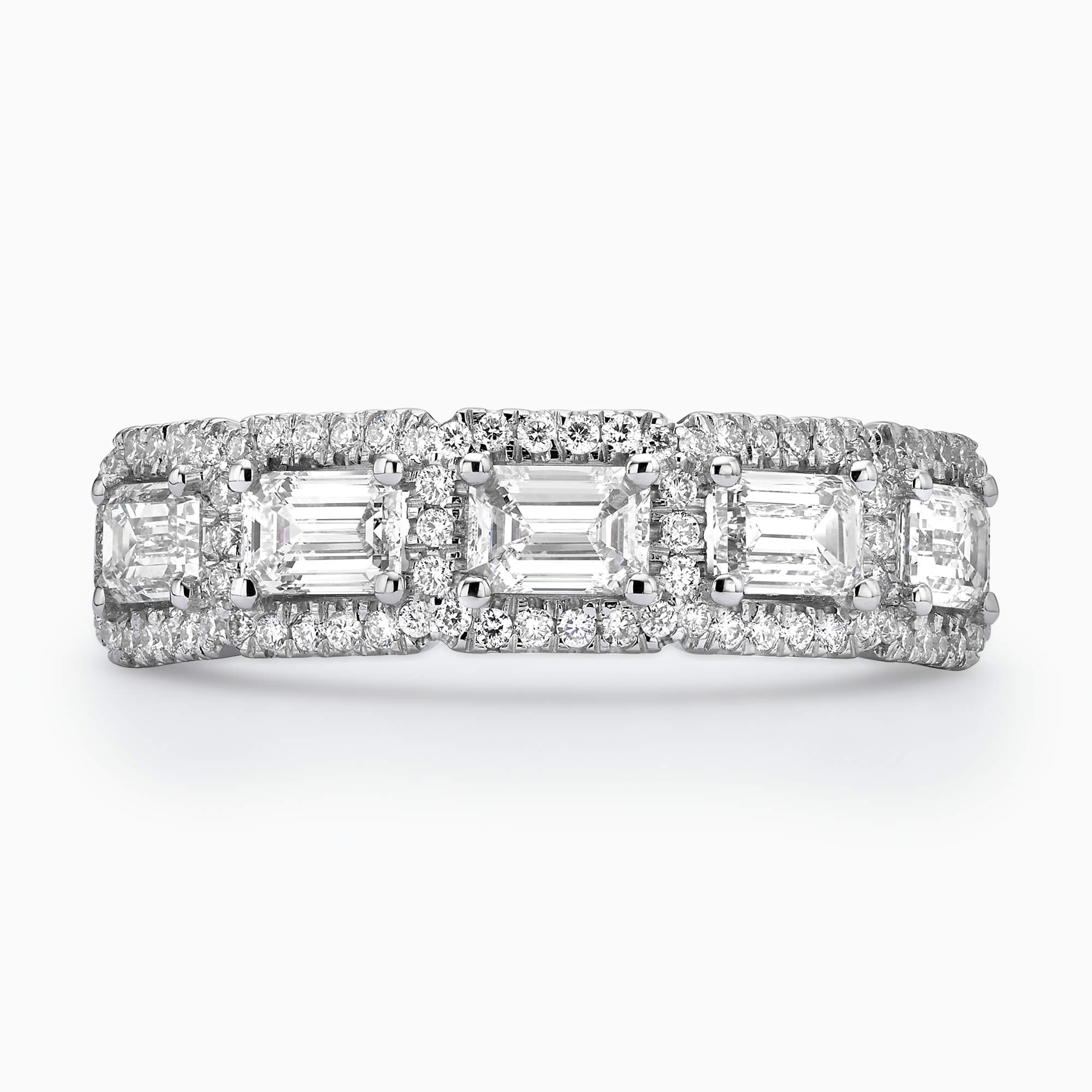 5 Emerald Cut Diamonds (Total 1.20Ct.) with 0.39Ct. Diamond