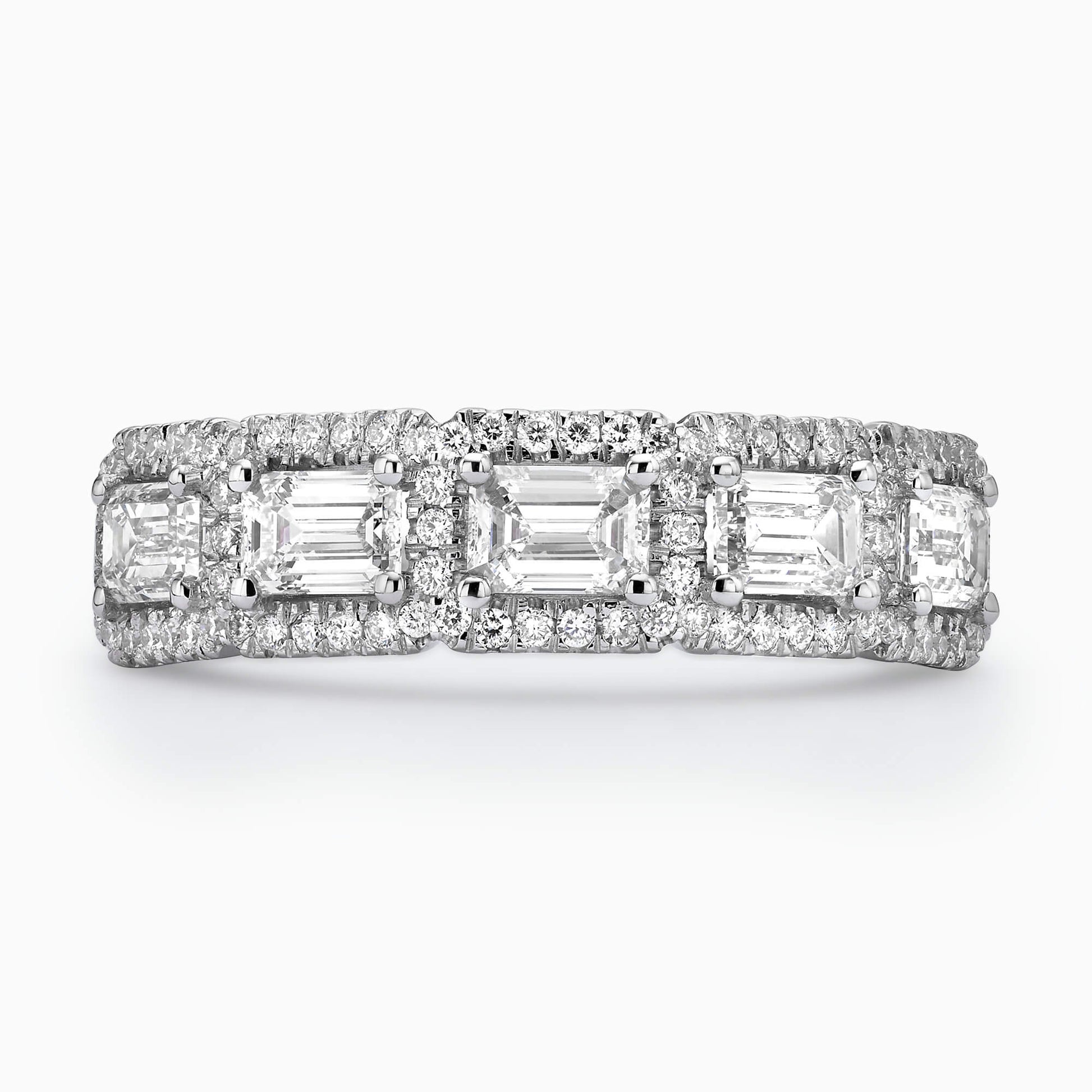 5 Emerald Cut Diamonds (Total 1.20Ct.) with 0.39Ct. Diamond