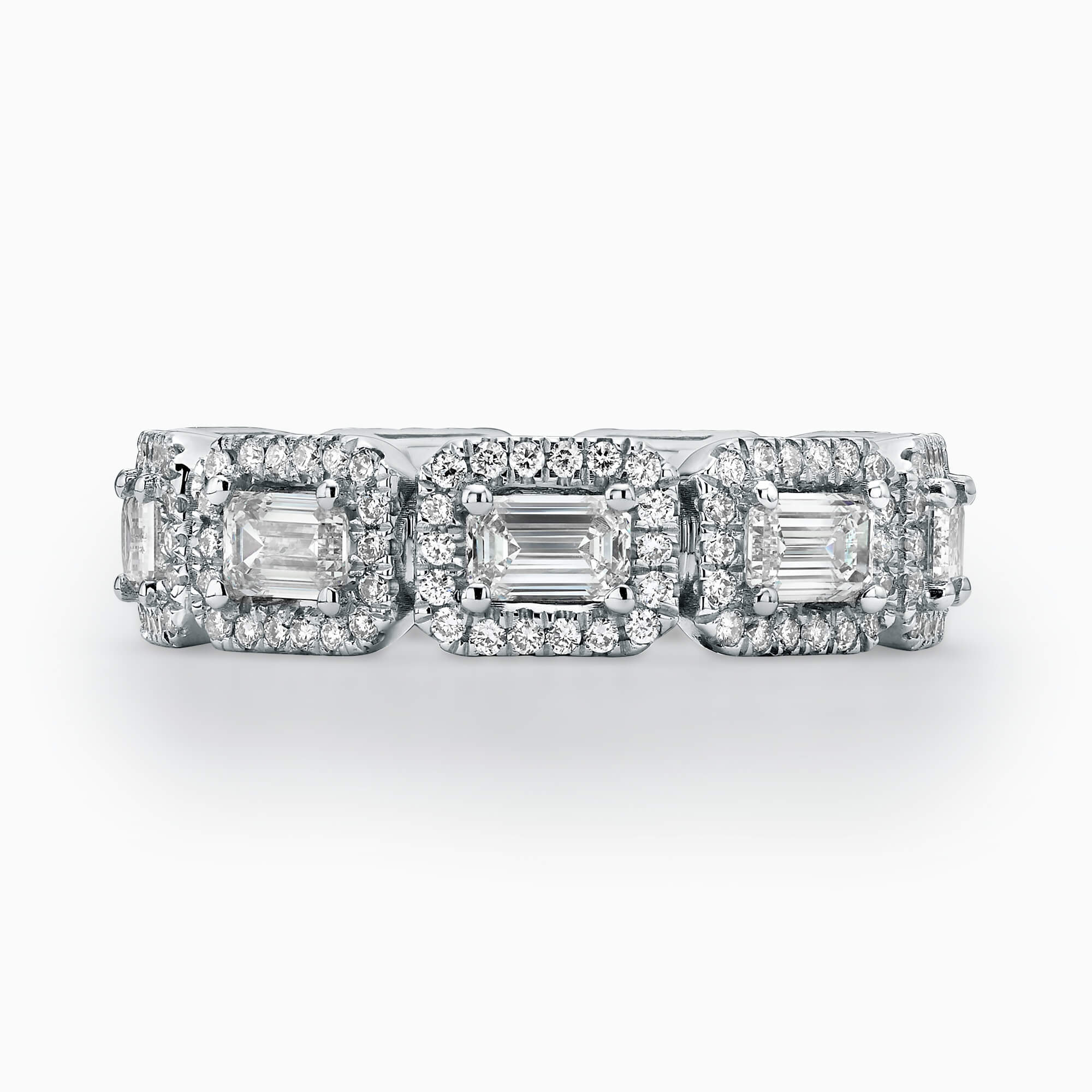 9 Emerald Cut Diamonds (Total 2.16Ct.) with diamond Halo