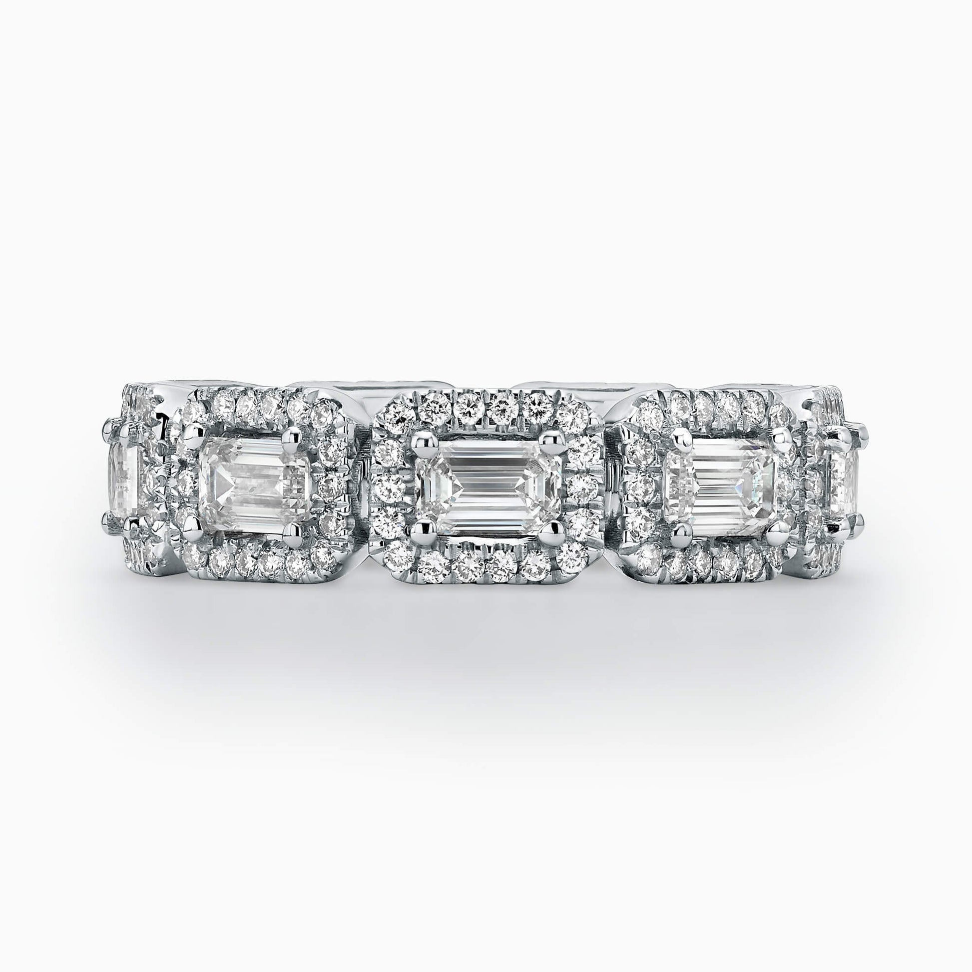 9 Emerald Cut Diamonds (Total 2.16Ct.) with diamond Halo