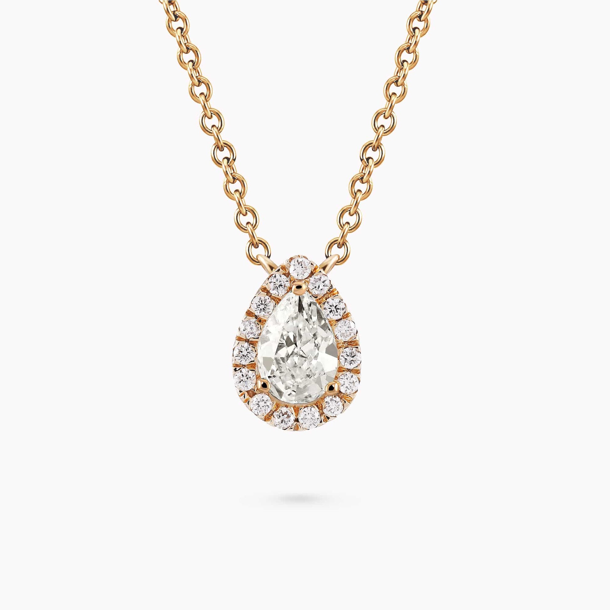 14K Gold drop Pendant with 0.16Ct. Diamond Halo set with