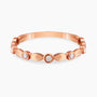 0.14Ct. Diamonds mounted in a 14K Rose Gold Ring