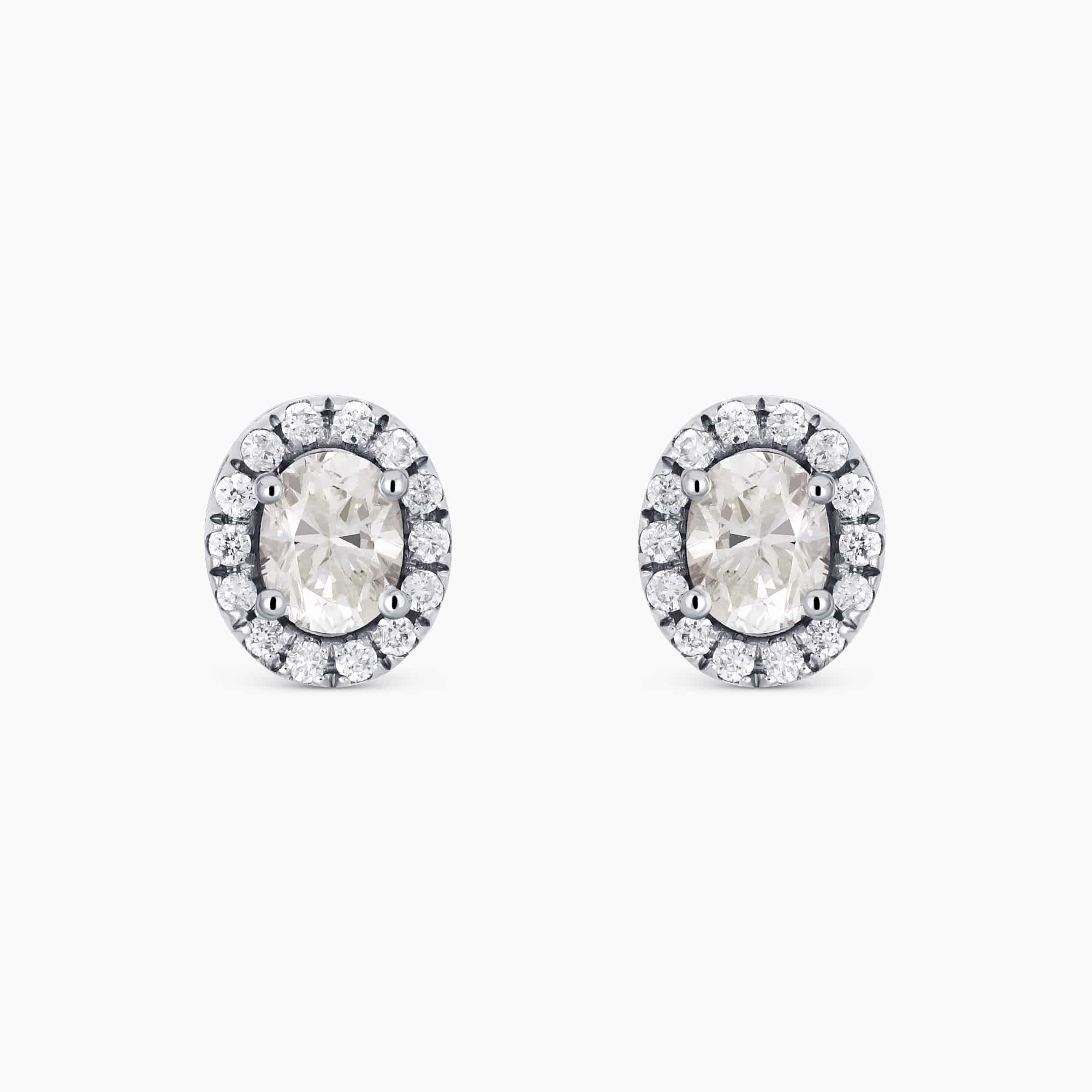 0.54Ct. Oval cut center Diamonds with 0.14Ct Diamond