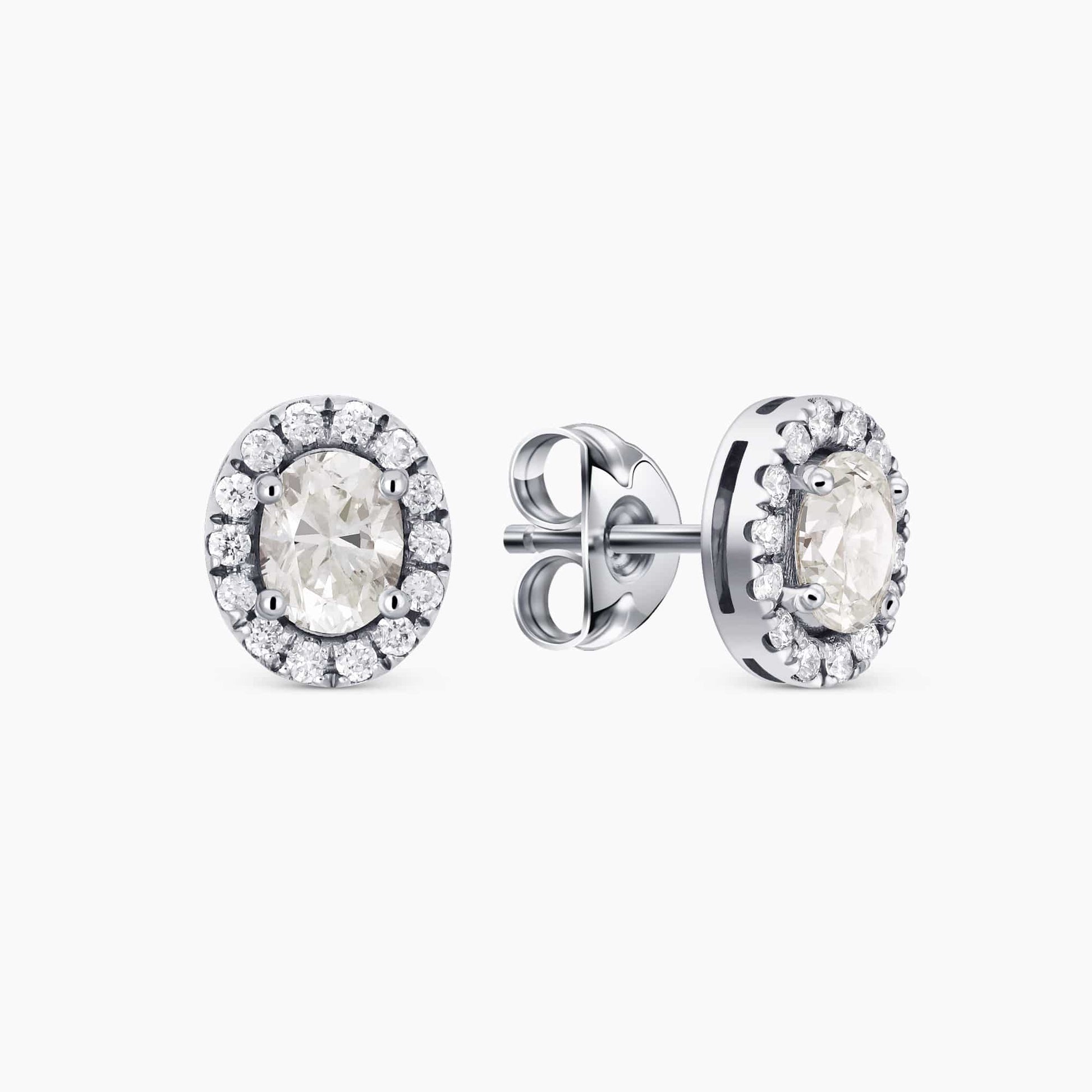 0.54Ct. Oval cut center Diamonds with 0.14Ct Diamond