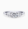A ring, 14K gold, set with a center round cut diamond