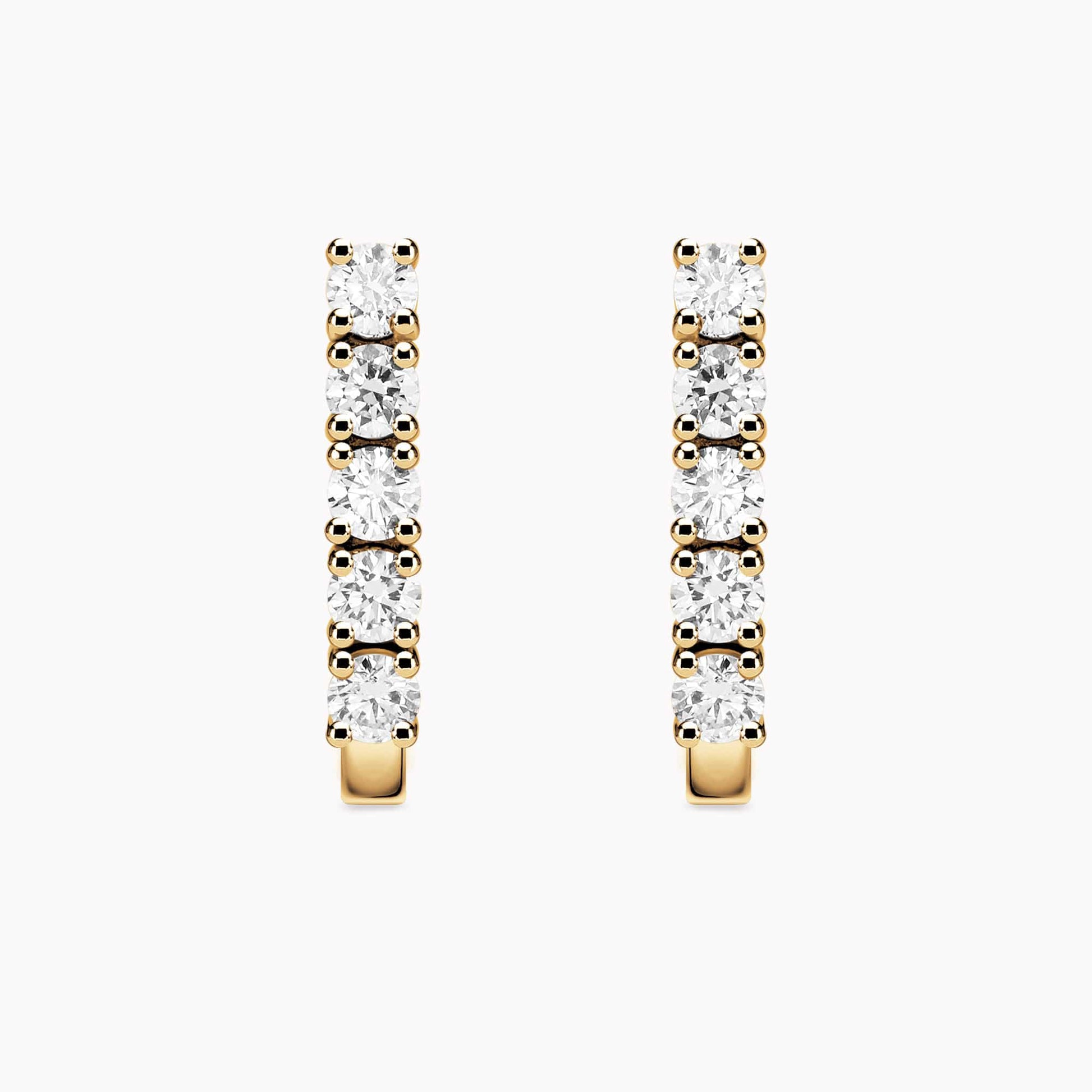 0.95Ct. Diamond Earrings mounted in 14K Yellow Gold