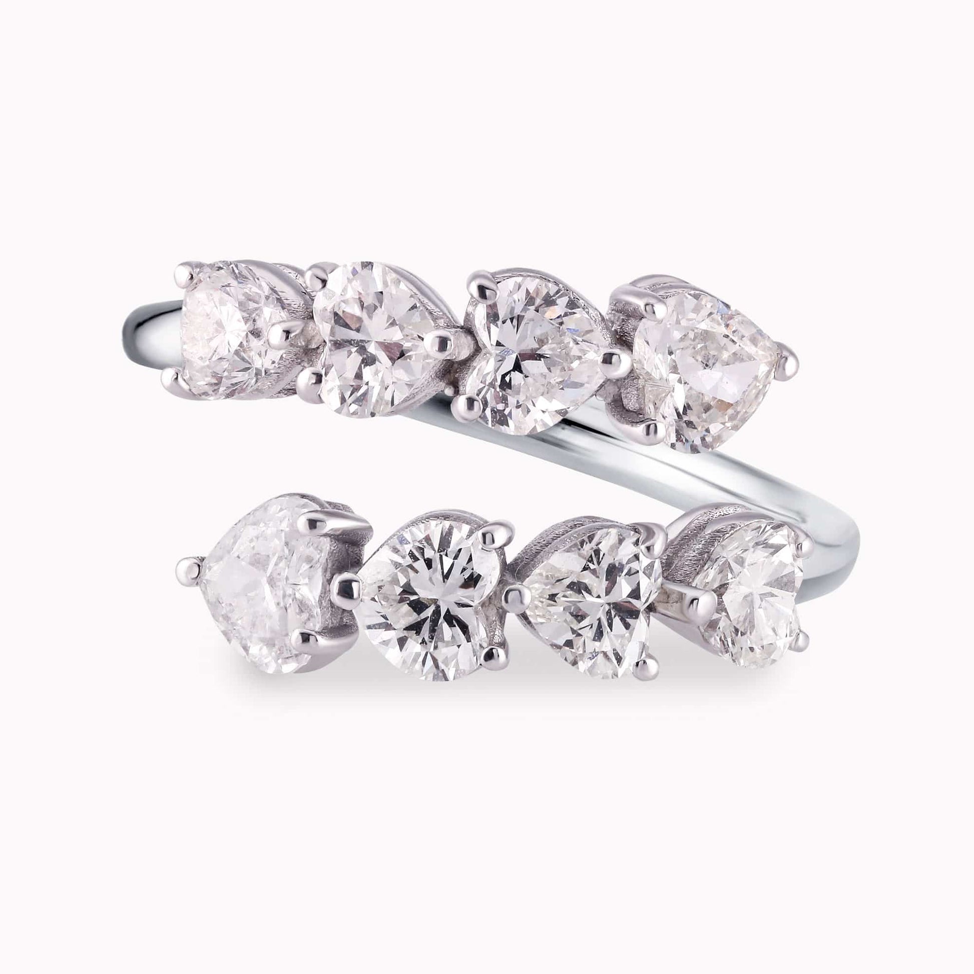1.69Ct. Heart Shape Diamonds mounted in a Bypass design 14K
