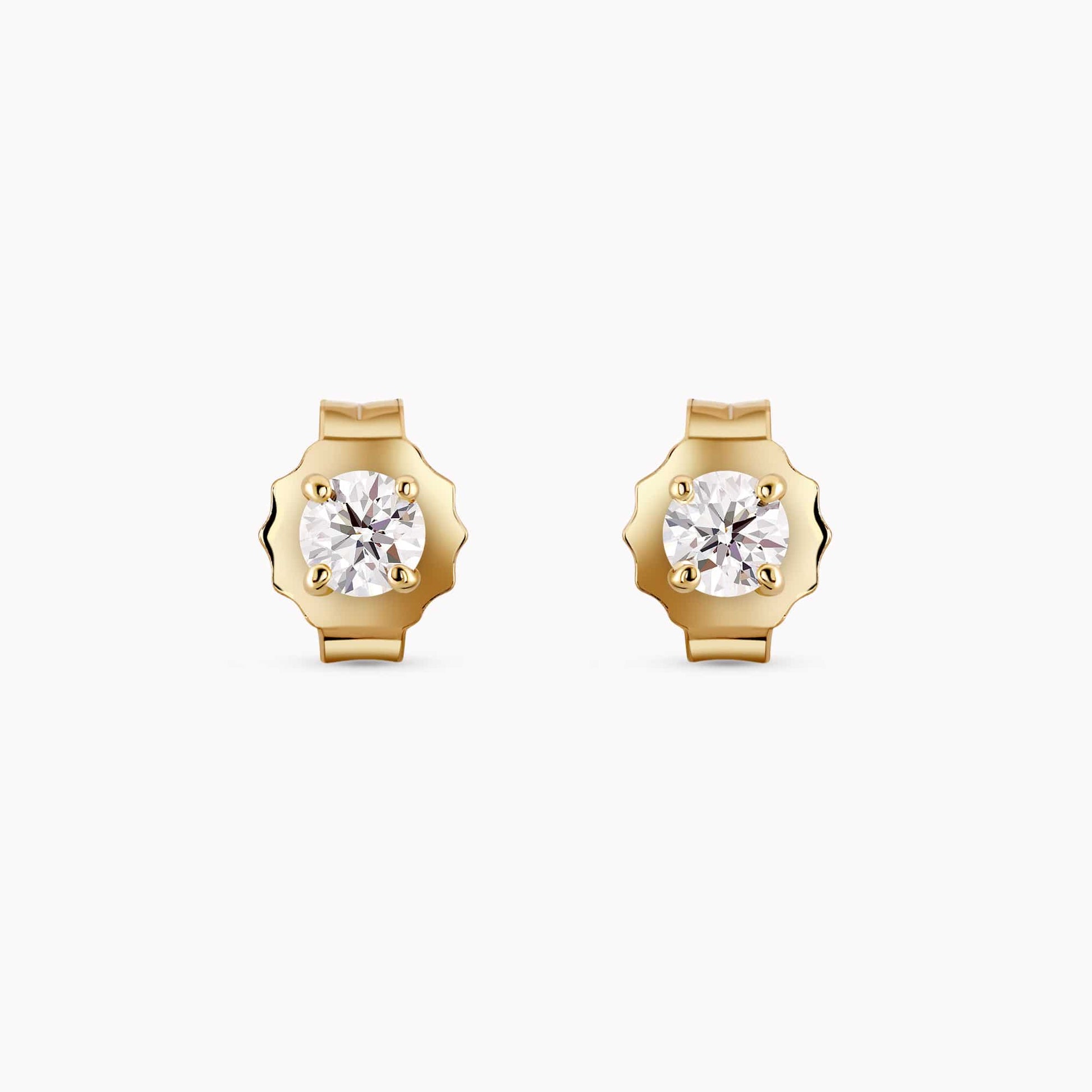 0.25Ct. Diamond Earrings mounted in 14K Yellow Gold