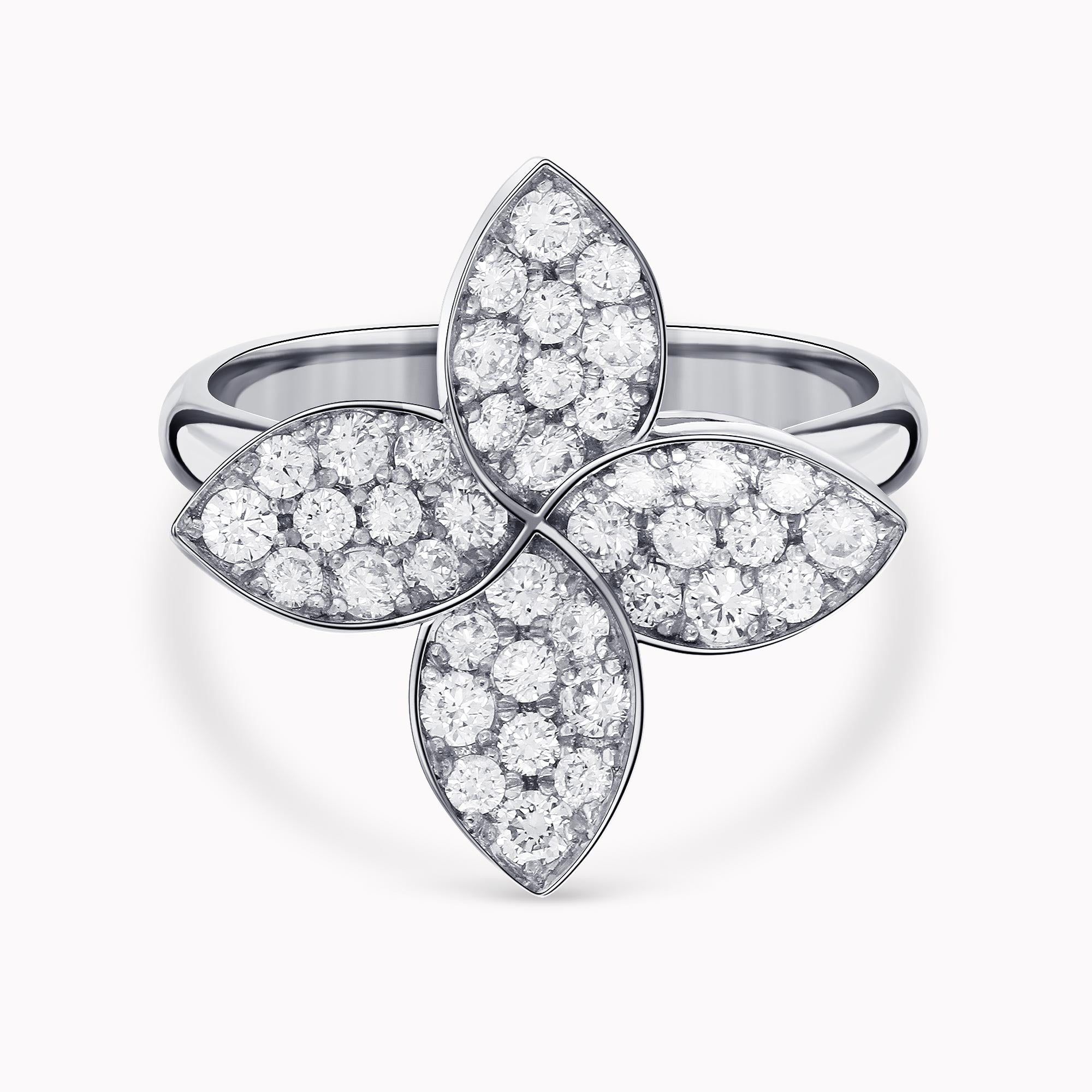 0.93Ct. Diamonds mounted in a 14K White Gold Flower designed Ring