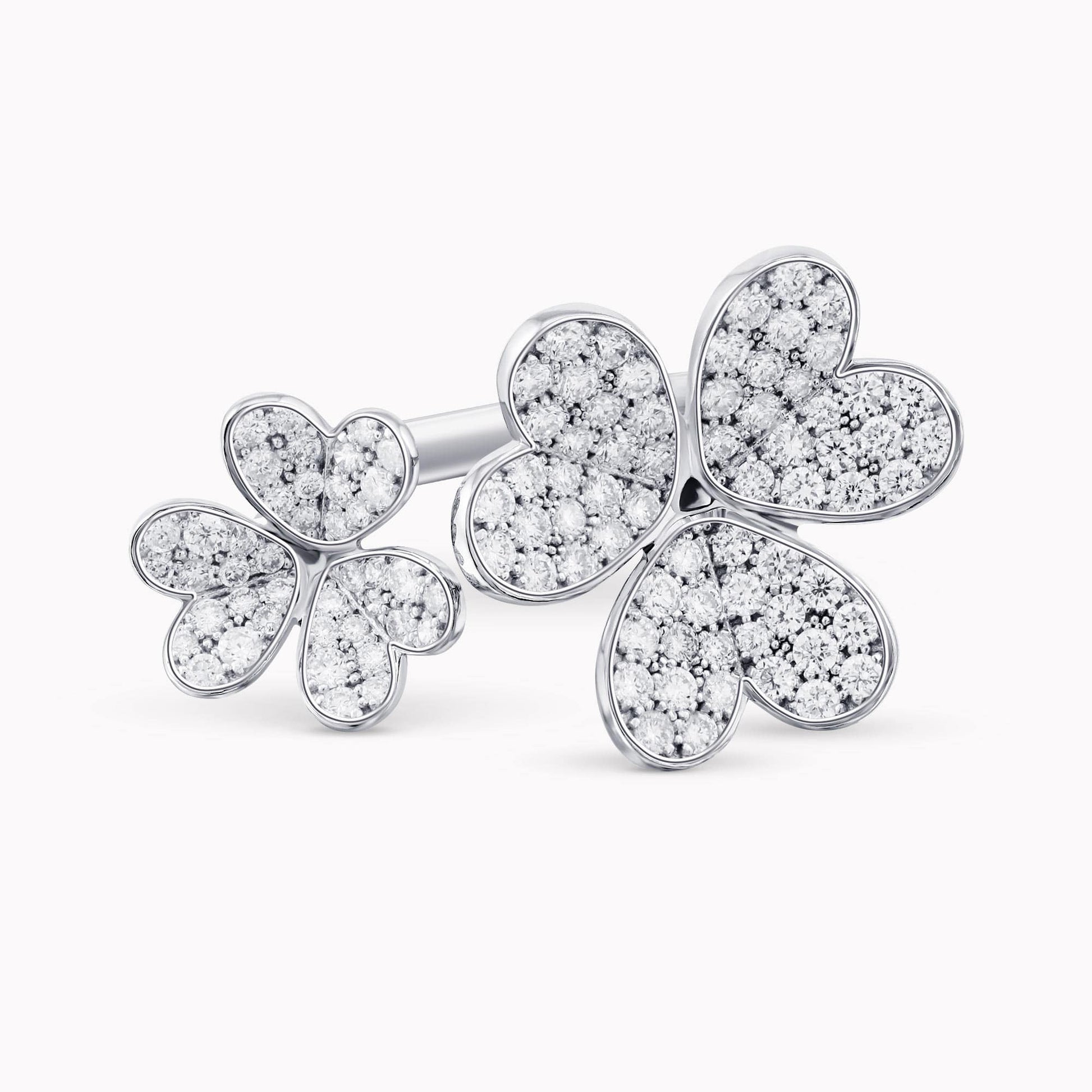 1.09Ct. Diamonds mounted in a 14K White Gold Flower designed Ring