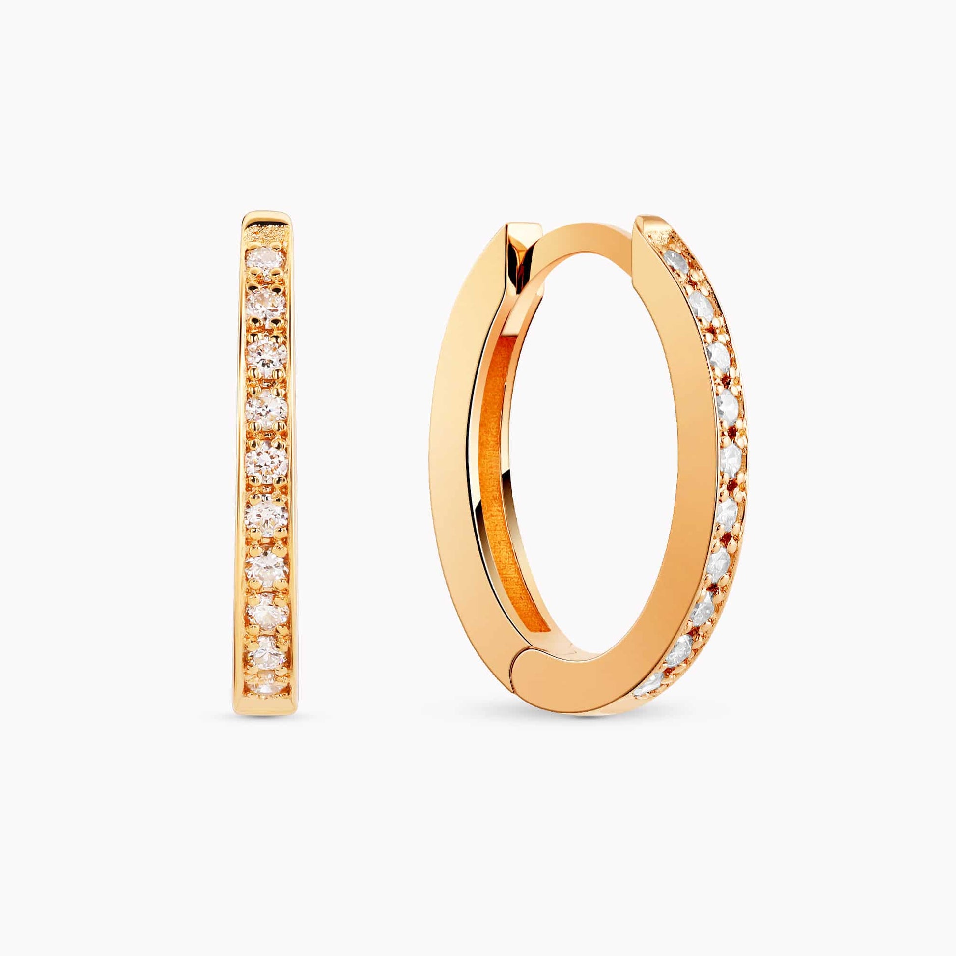 0.20Ct. Diamond Hoop Earrings mounted in 14K Yellow Gold