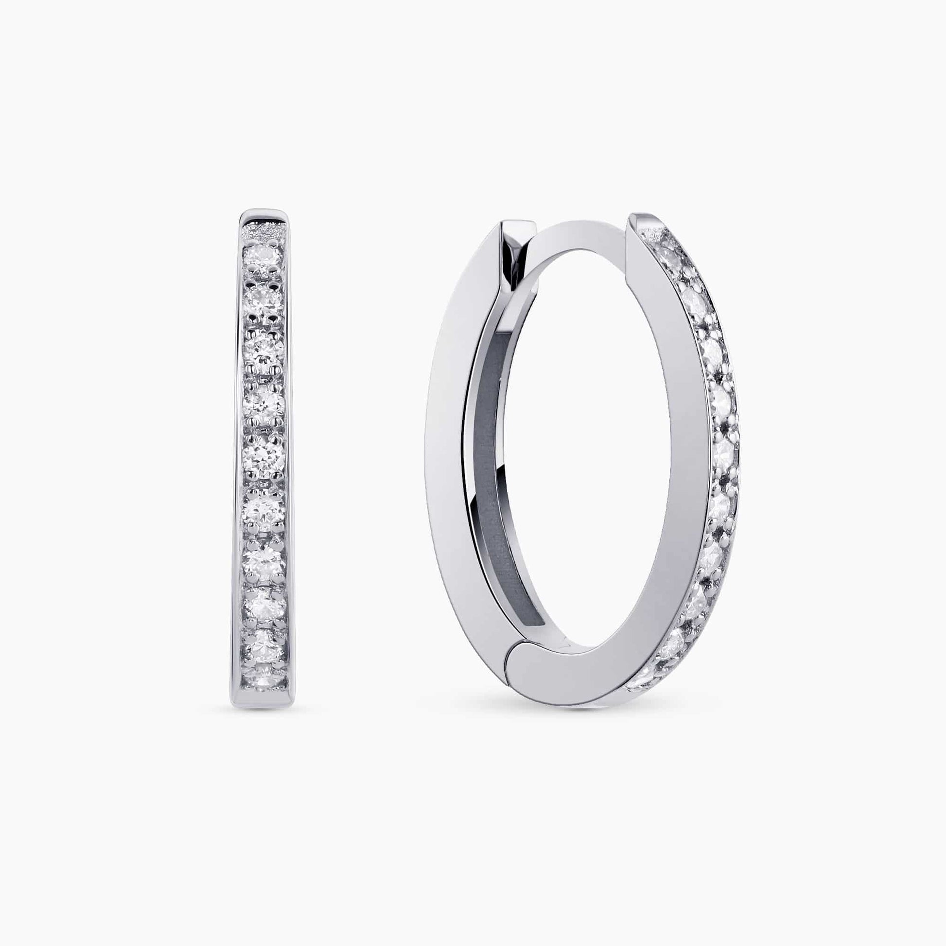 0.20Ct. Diamond Hoop Earrings mounted in 14K White Gold