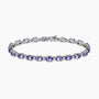 9.40Ct. Tanzanite stones set with 1.21Ct. Diamonds in a 14K