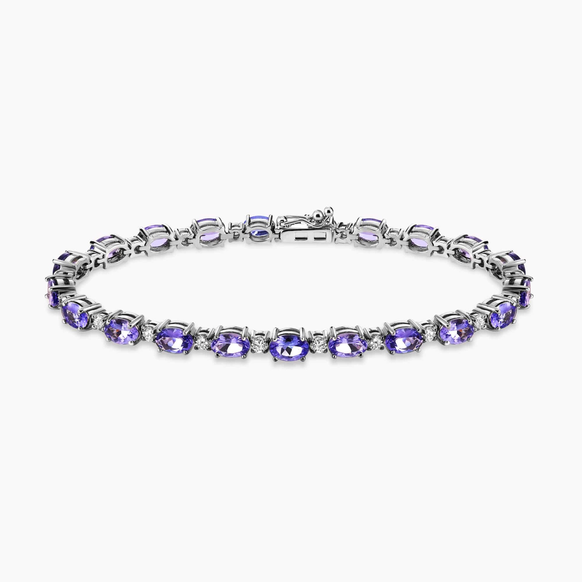 9.40Ct. Tanzanite stones set with 1.21Ct. Diamonds in a 14K