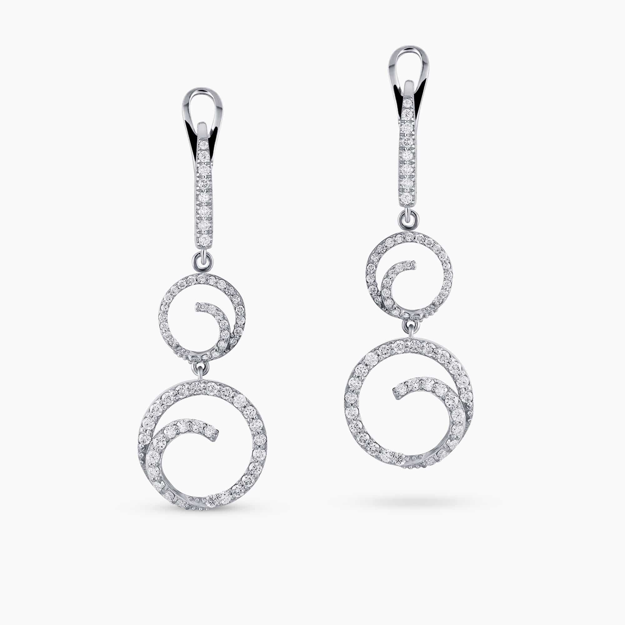 0.95Ct. Diamonds mounted in 14K White Gold Earrings