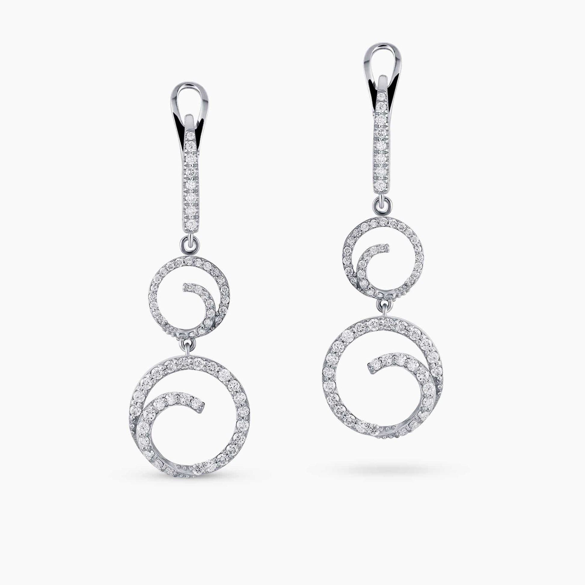 0.95Ct. Diamonds mounted in 14K White Gold Earrings