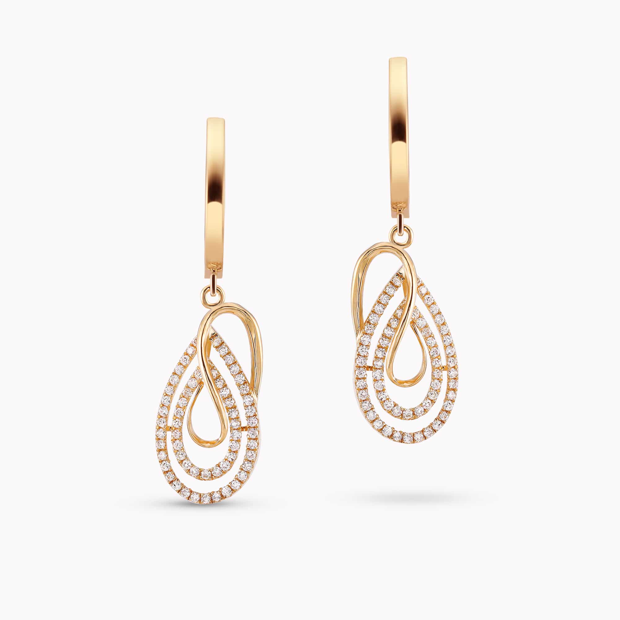 0.70Ct. Diamonds mounted in 14K Yellow Gold Earrings