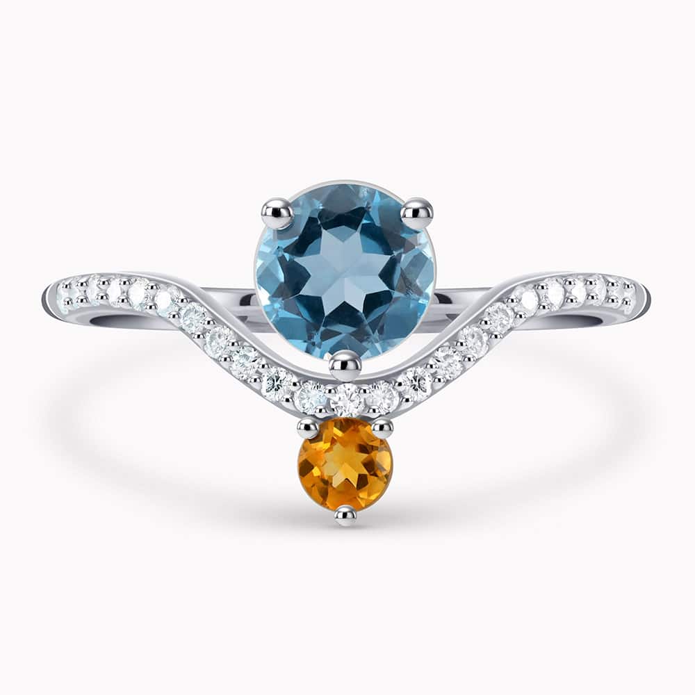 0.80Ct. Blue Topaz and 0.20Ct. Citrine set with 0.14Ct