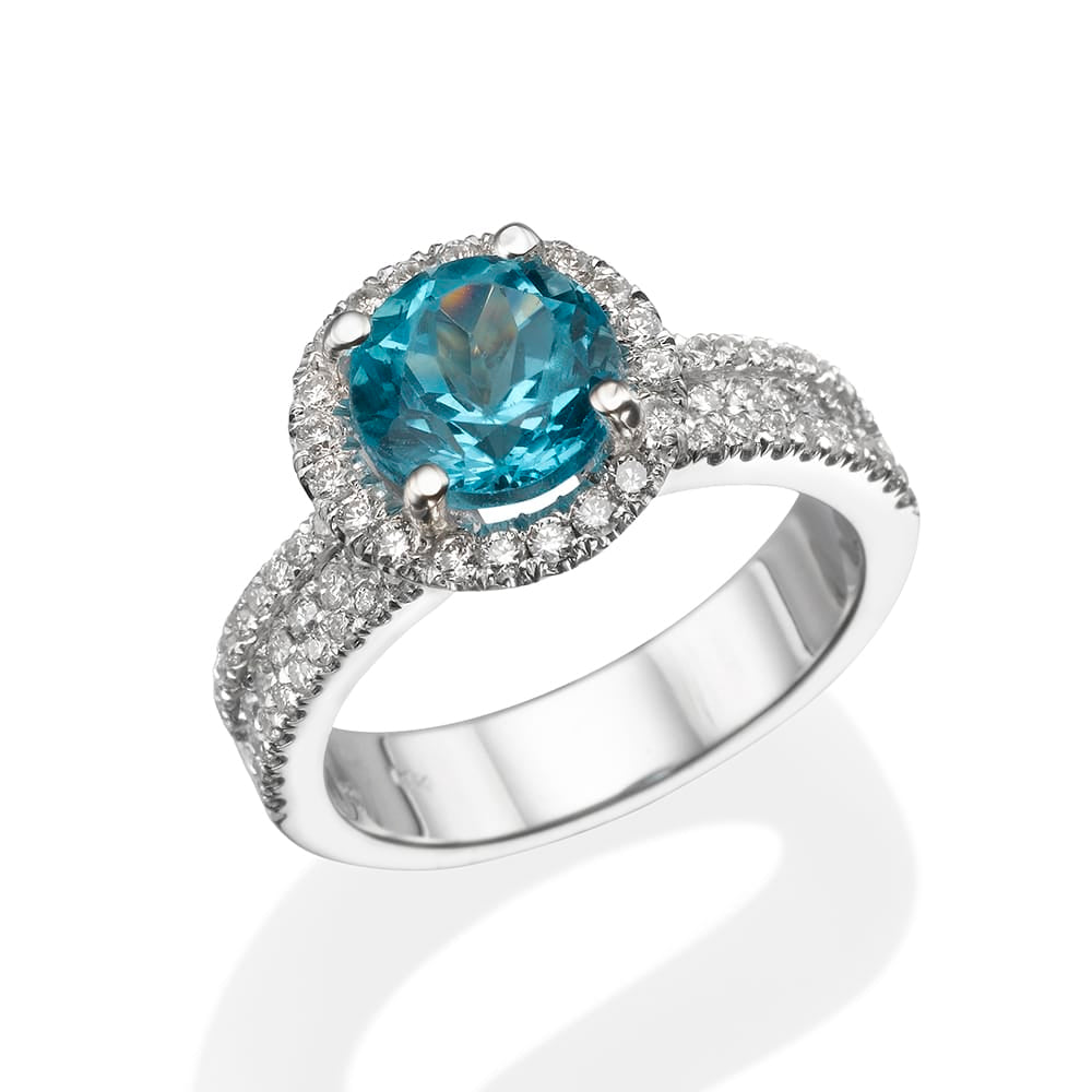 2.71Ct. Blue Topaz Gem Stone with 0.73Ct Diamond Halo set