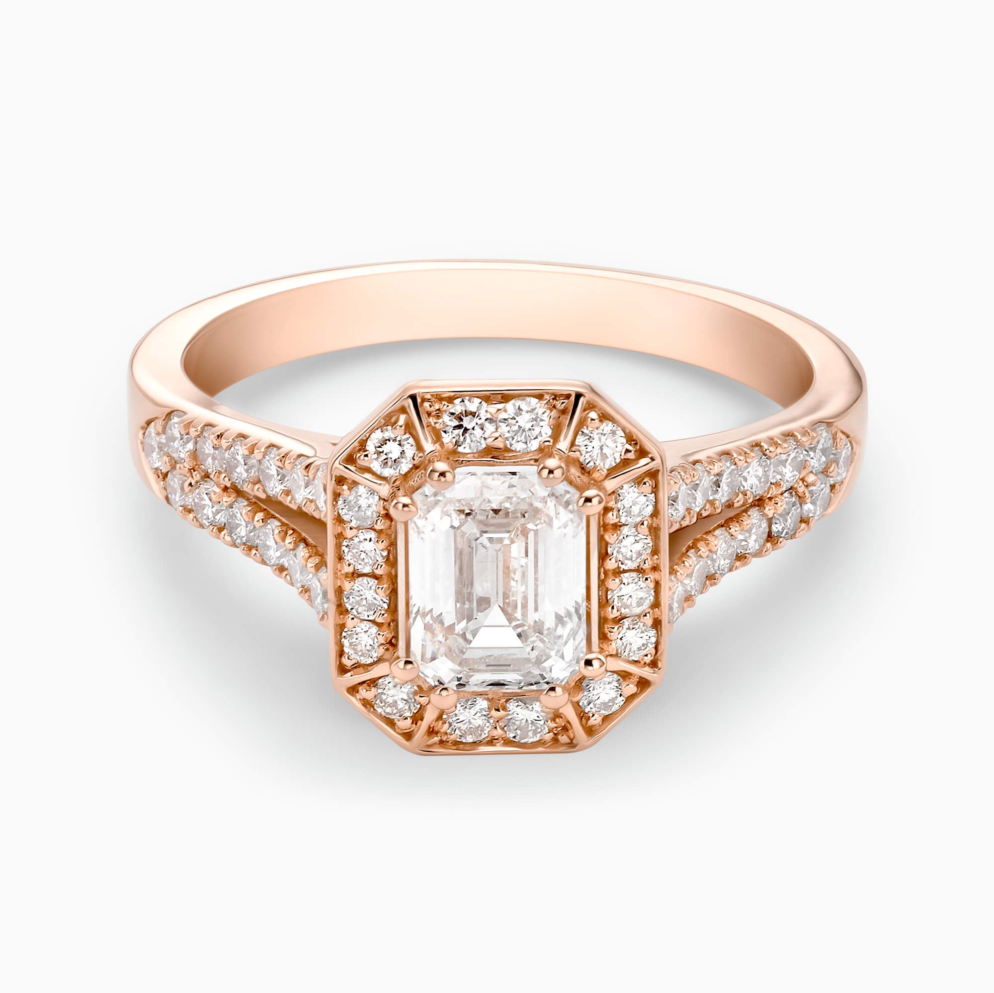 0.70Ct. Emerald Cut Diamond, with 0.82Ct. Diamonds setting