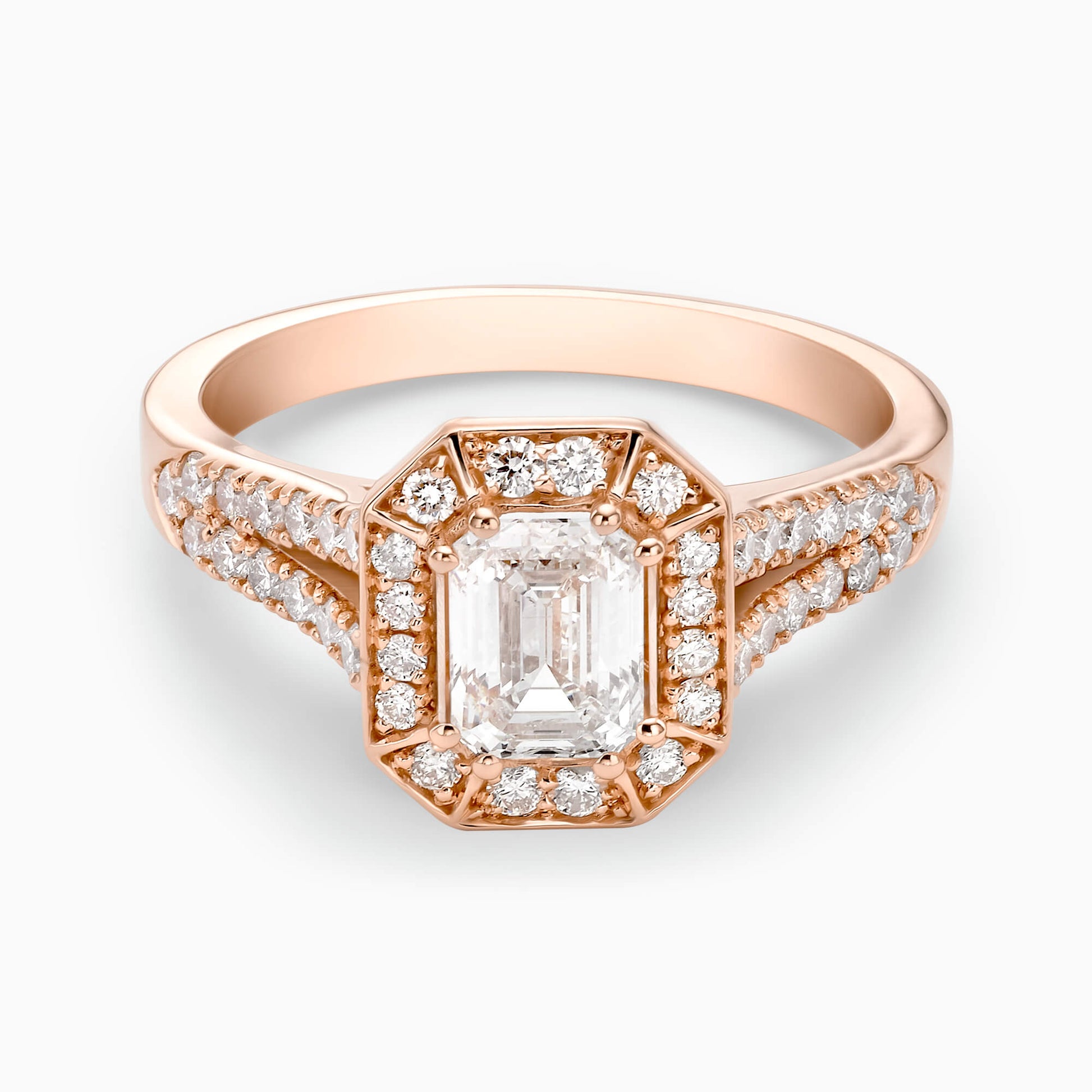 0.70Ct. Emerald Cut Diamond, with 0.82Ct. Diamonds setting