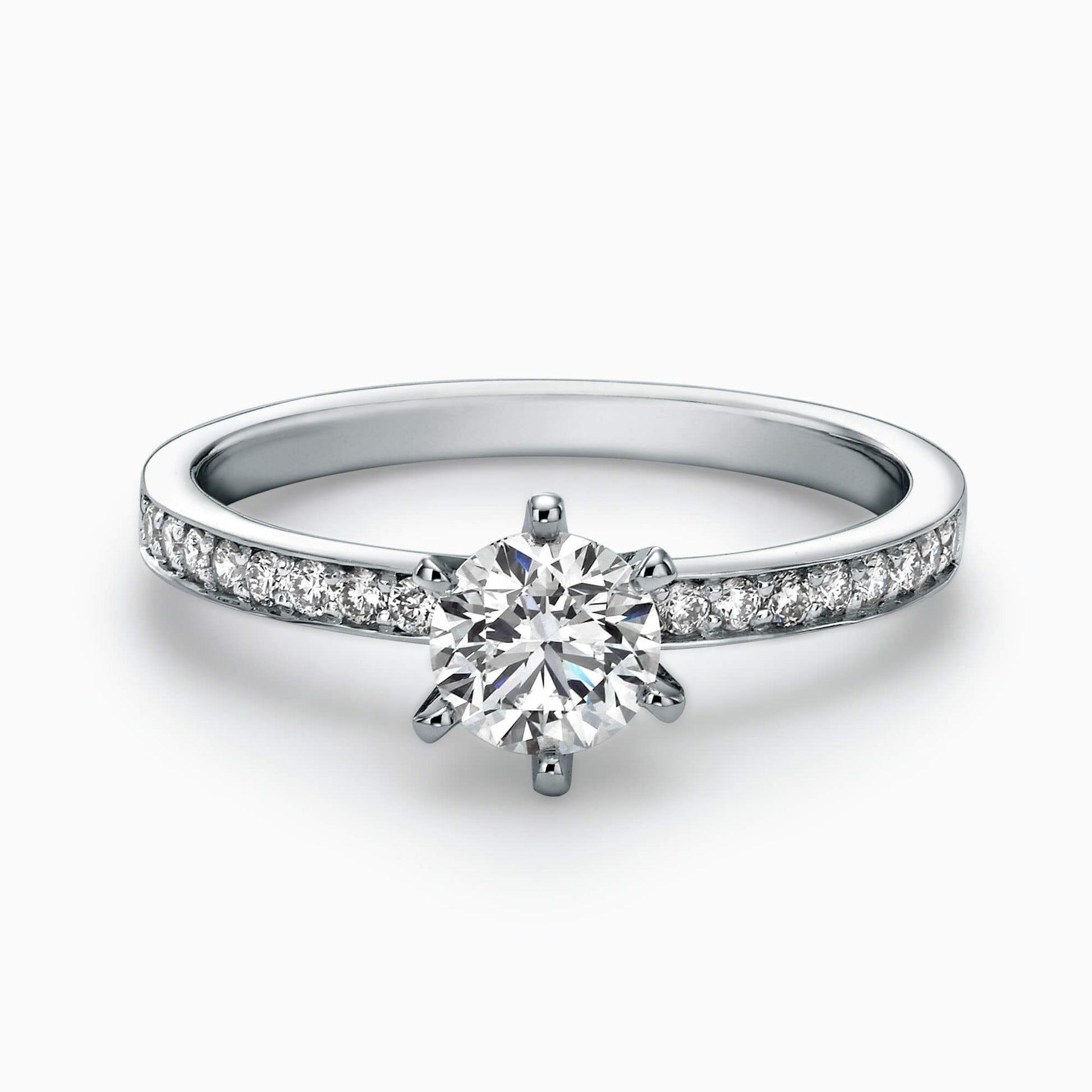 A ring, 14K gold, with a center round cut diamond starting