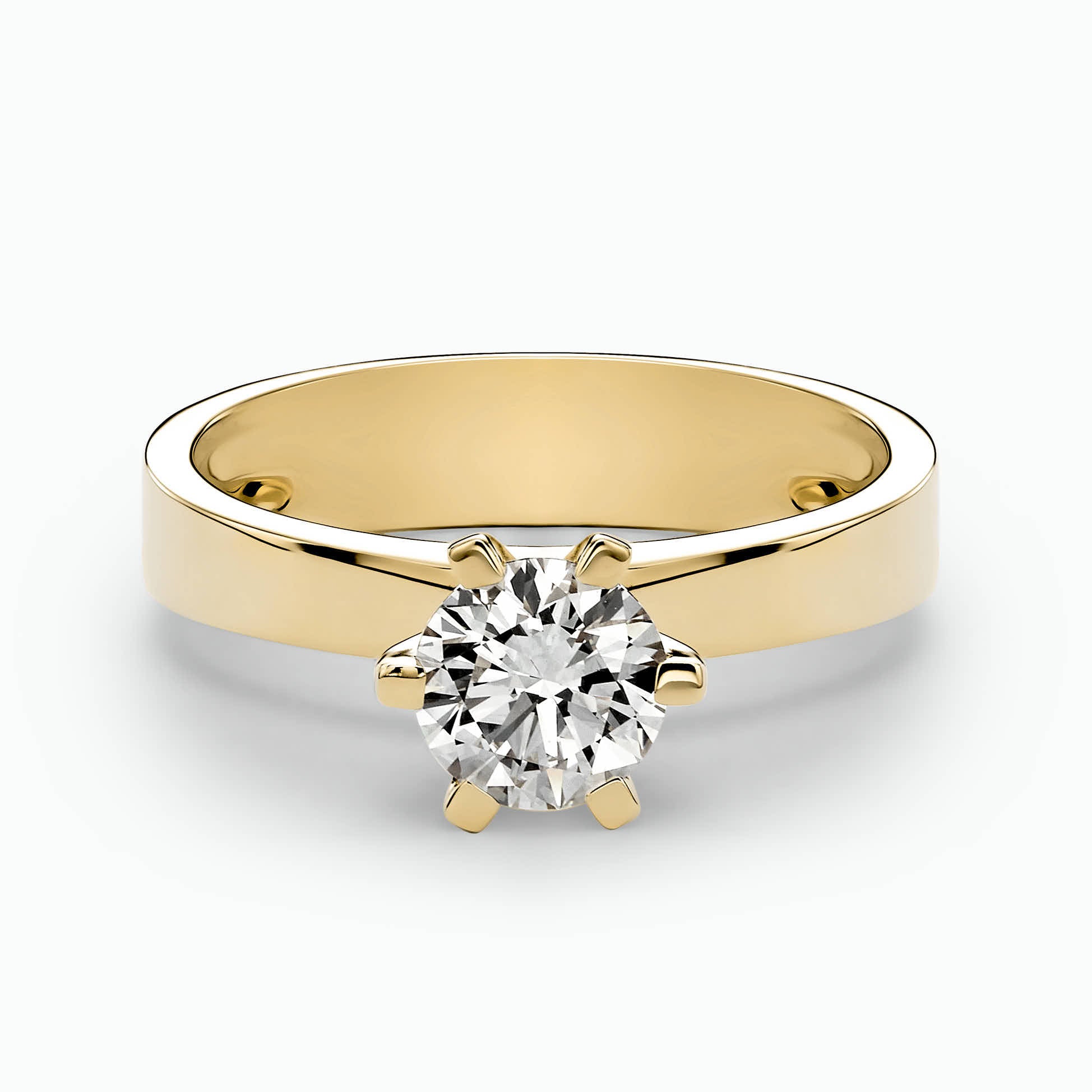 A 6prong ring, 14K gold, set with a center round cut