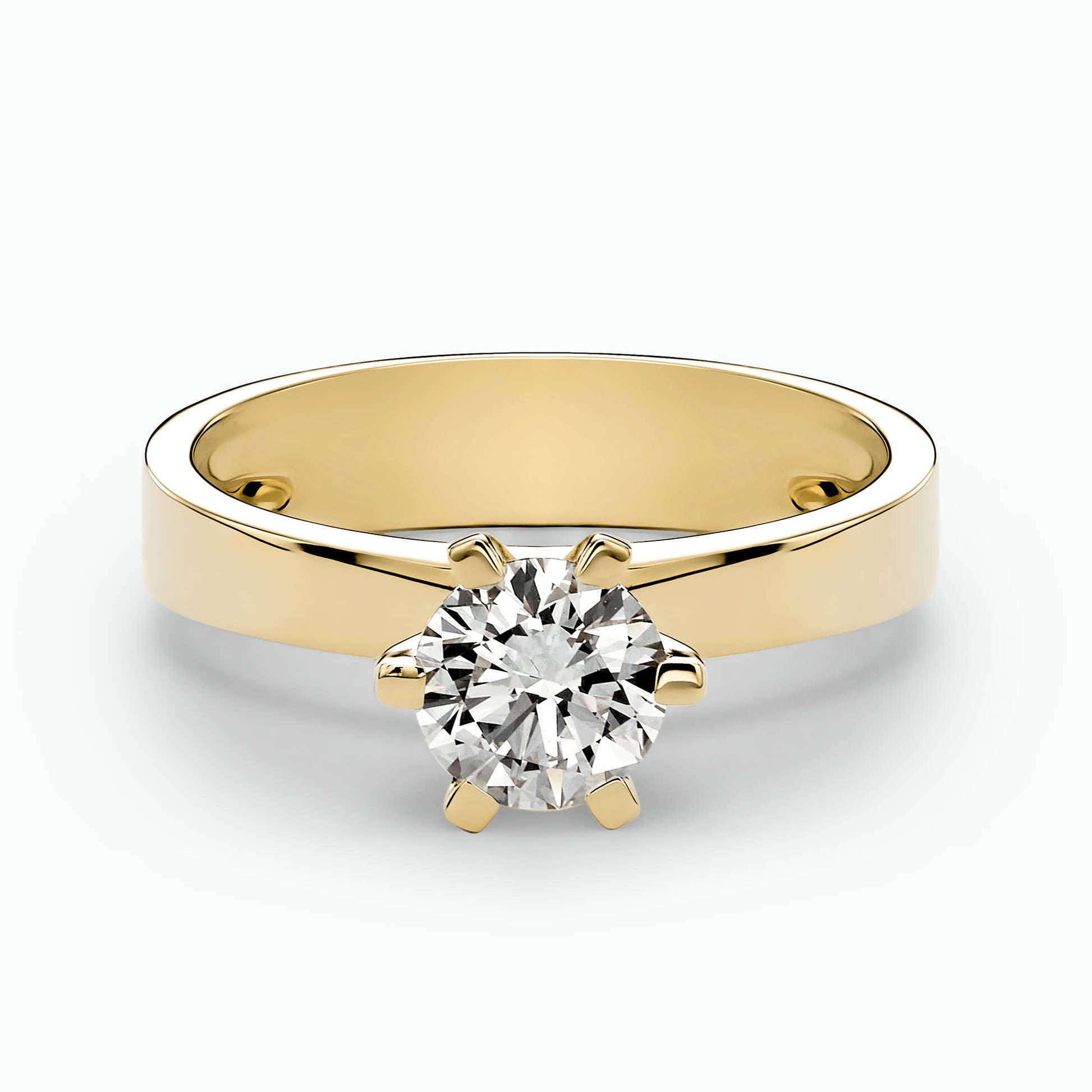 A 6prong ring, 14K gold, set with a center round cut