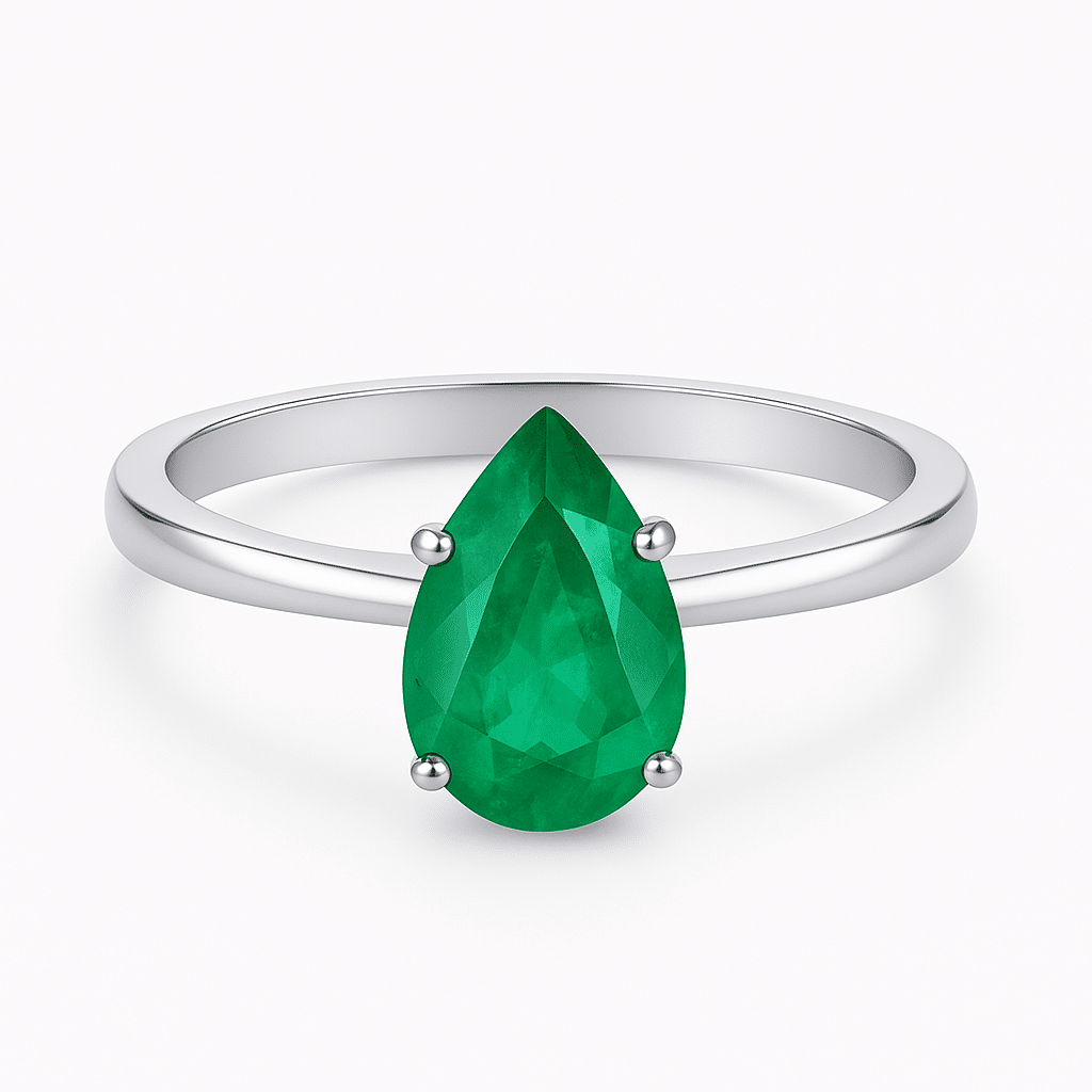 1.46Ct. Pear shape Emerald stone set in 14K Gold Ring